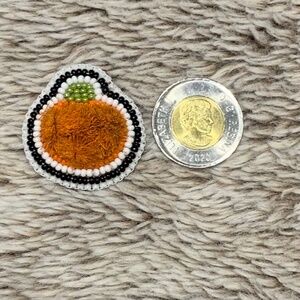 Caribou Tufted Pumpkin Brooch